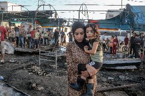 Aftermath of Israeli Strike on Displaced Civilians - Gaza