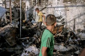 Aftermath of Israeli Strike on Displaced Civilians - Gaza