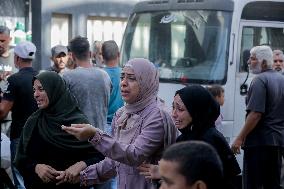 Relatives of the victims killed in the airstrike on Al-Mufti school in Nuseirat Camp