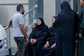 Relatives of the victims killed in the airstrike on Al-Mufti school in Nuseirat Camp