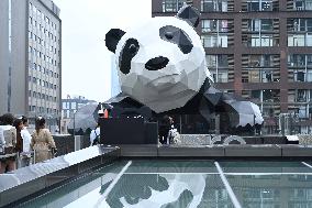 Wall-climbing Giant Panda Sculpture in Chengdu