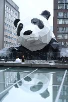 Wall-climbing Giant Panda Sculpture in Chengdu