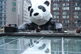 Wall-climbing Giant Panda Sculpture in Chengdu