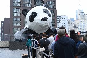 Wall-climbing Giant Panda Sculpture in Chengdu