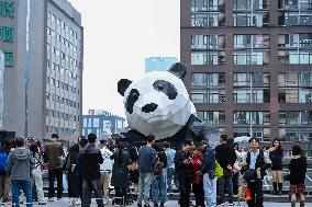 Wall-climbing Giant Panda Sculpture in Chengdu