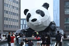 Wall-climbing Giant Panda Sculpture in Chengdu