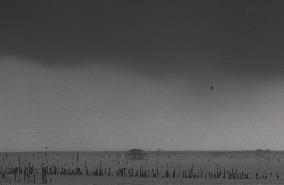 Rain Clouds Gather Over A Cottage In Chonburi/