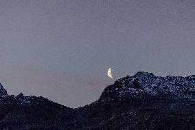 Waning Crescent Moon In Tromso, Norway