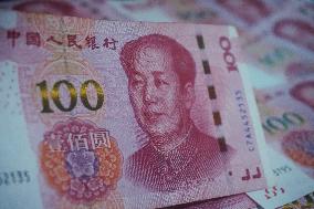 Banks Cut Interest Rates on Renminbi Deposits