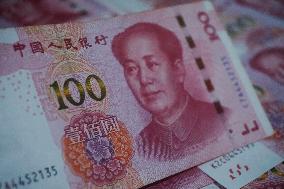 Banks Cut Interest Rates on Renminbi Deposits