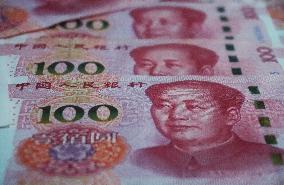 Banks Cut Interest Rates on Renminbi Deposits