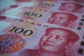 Banks Cut Interest Rates on Renminbi Deposits