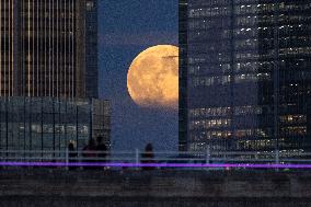 Full Moon Rises Over The Financial District - London