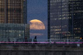 Full Moon Rises Over The Financial District - London