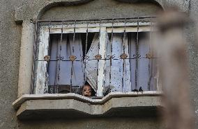 Palestinians Inspect Buildings Bombed