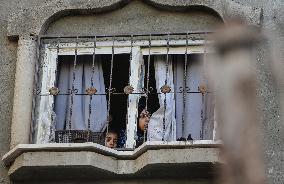 Palestinians Inspect Buildings Bombed