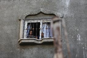 Palestinians Inspect Buildings Bombed