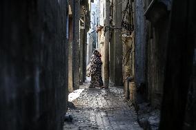 Palestinians Inspect Buildings Bombed