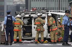 Man throws "Molotov cocktails" near LDP HQ