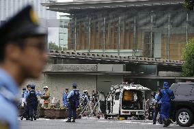 Man throws "Molotov cocktails" near LDP HQ