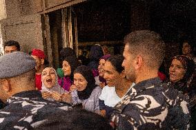 Lebanese military attempts to evacuate displaced people from a Beirut building