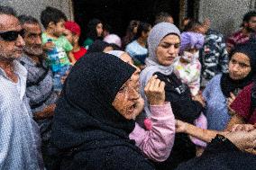 Lebanese military attempts to evacuate displaced people from a Beirut building