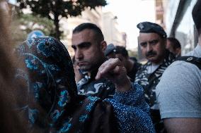 Lebanese military attempts to evacuate displaced people from a Beirut building