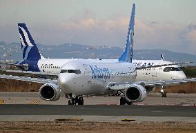 Diverse aircraft on the takeoff runway