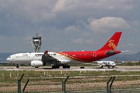 Diverse aircraft on the takeoff runway