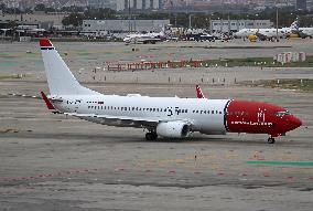 Diverse aircraft on the takeoff runway