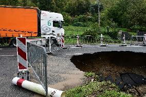 A Collapsed Road After Flooding In The Rhone Valley