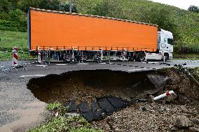 A Collapsed Road After Flooding In The Rhone Valley