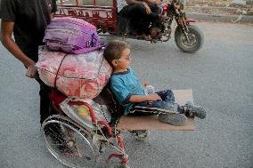 Displaced Palestinians Leave School In Beit Lahia - Gaza