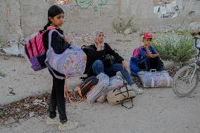 Displaced Palestinians Leave School In Beit Lahia - Gaza