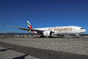 Emirates Boeing 777 preparing to take off from Barcelona Airport