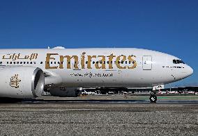 Emirates Boeing 777 preparing to take off from Barcelona Airport