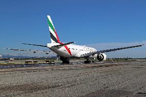 Emirates Boeing 777 preparing to take off from Barcelona Airport