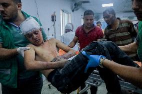 Multiple Casualties Arrive At Al-Ahli Arab Hospital - Gaza