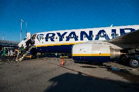 Passengers Boarding A Ryanair Aircraft Of The Low Cost Carrier