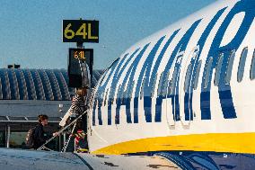 Passengers Boarding A Ryanair Aircraft Of The Low Cost Carrier