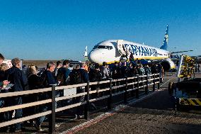 Passengers Boarding A Ryanair Aircraft Of The Low Cost Carrier