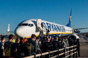 Passengers Boarding A Ryanair Aircraft Of The Low Cost Carrier