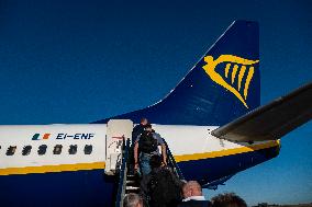 Passengers Boarding A Ryanair Aircraft Of The Low Cost Carrier