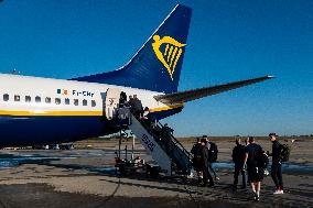 Passengers Boarding A Ryanair Aircraft Of The Low Cost Carrier