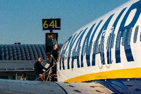 Passengers Boarding A Ryanair Aircraft Of The Low Cost Carrier