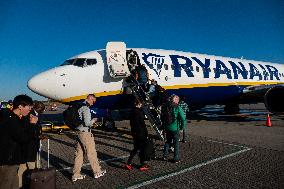 Passengers Boarding A Ryanair Aircraft Of The Low Cost Carrier