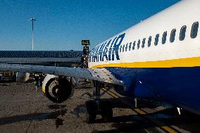 Passengers Boarding A Ryanair Aircraft Of The Low Cost Carrier