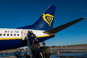 Passengers Boarding A Ryanair Aircraft Of The Low Cost Carrier