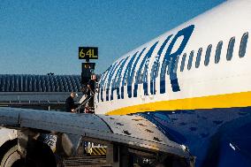 Passengers Boarding A Ryanair Aircraft Of The Low Cost Carrier