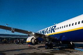 Passengers Boarding A Ryanair Aircraft Of The Low Cost Carrier